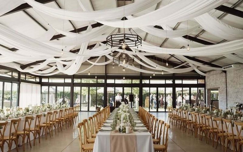 Full venue styling with draping and lighting